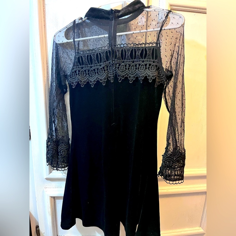 Vestido negro para niña 
Talla 14 
Usado